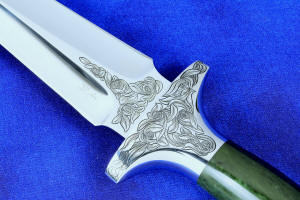 "Daqar" Custom handmade dagger, engraved stainless steel guard detail view ,  in T4 deep cryogenically treated CPM 154CM Powder metal technology martensitic stainless steel blade, hand-engraved, 304 austenitic stainless steel fittings, hand-engraved, nephrite jade gemstone handle, hand-carved leather sheath inlaid with American Bison skin