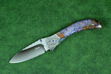 "Starling" fine handmade custom folding knife, obverse side view in high molybdenum stainless steel blade, engraved stainless bolsters, faceted amethyst gemstone accents and Rio Grande Agate handle